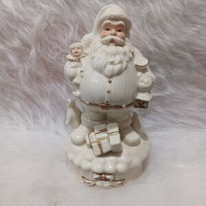 Porcelain Santa Wind Up Musical“Santa Claus Is Coming To Town”